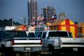 Photograph: [Two trucks parked at the North Texas State Fair]