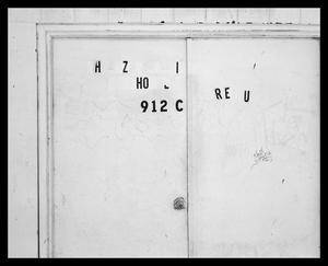 [Letters and numbers on a door]