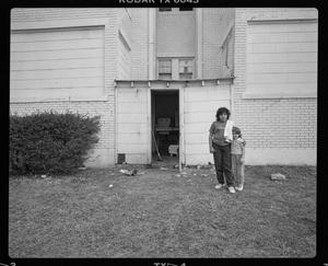 [Mom and Child in front of House, 1988]