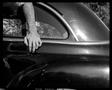 Photograph: [Don Irby Hand on Car, 1975]