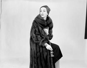 [A woman posing in a fur coat, 4]