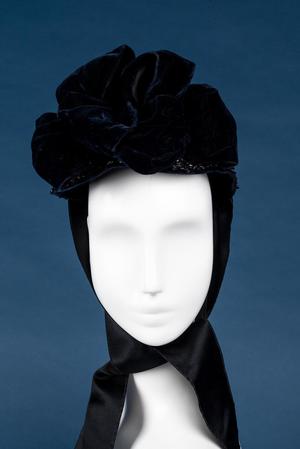 Primary view of object titled 'Black silk velvet bonnet'.
