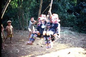 Children with village swing