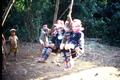 Photograph: Children with village swing