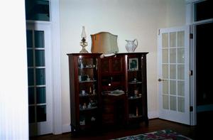 [A China cabinet at the Country Place at Cross Roads, 1]
