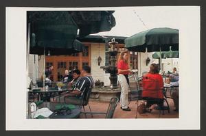 [Customers dining on an outdoor patio at Texican]