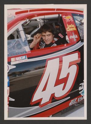 Primary view of object titled '[Adam Petty in his car]'.