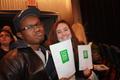 Photograph: [Two Students with UNT "Four Bold Goals" Pamphlets]