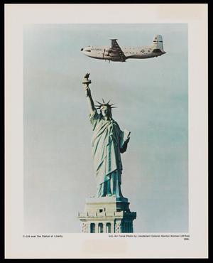 [C-124 over the Statue of Liberty]