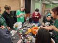 Photograph: [Large group decorating their library pumpkin]