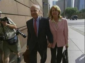 [News Clip: Media Frenzy Captures Influential Political Couple's Stroll]
