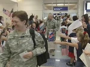 [News Clip: Heartwarming Reception as Armed Forces Return from Mission at DFW Airport]
