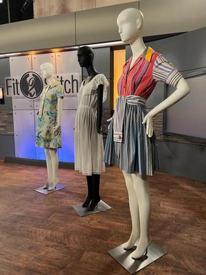 [Three mannequins featuring garments from the UNT Texas Fashion Collection]