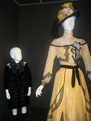 [A boy and woman's outfit from the 19th century]