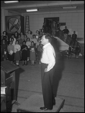 [Frank McKinley receives standing ovation for directing the Grand Chorus, March 26, 1960]