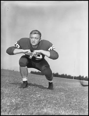 [Football Player Alton Crum No. 79 in a Blocking Position, September 1960]