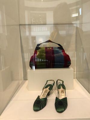 [A purse by Roberta di Camerino and shoes by Salvatore Ferragamo]