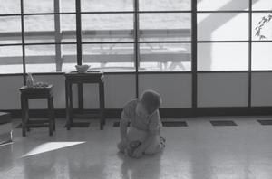 [A boy playing in a Japanese-inspired cabin, 2]
