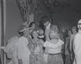 Photograph: [Five guests at a circus-themed party]
