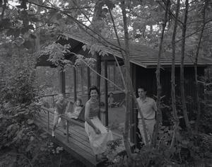 [A family lounging in a tree house, 6]