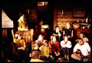 Primary view of object titled '[Adults and children gathered inside a room, 4]'.