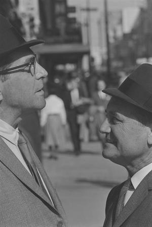 [Two men in hats on a sidewalk, 3]