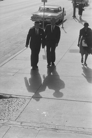 [Two men walking away from a car, 5]