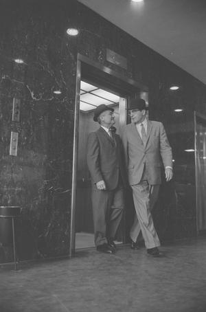 [Two men leaving an elevator in Dallas, 5]