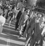Thumbnail image of item number 1 in: '[Pedestrians crossing a street, 6]'.