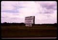 Photograph: [Large sign in a field]