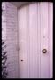 Photograph: [Wooden door in brick doorframe]