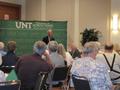 Photograph: [Dr. Bert Hayslip Addressing Members of the Emeritus College Arriving…