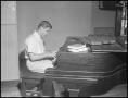 Photograph: [Don Graham playing piano]