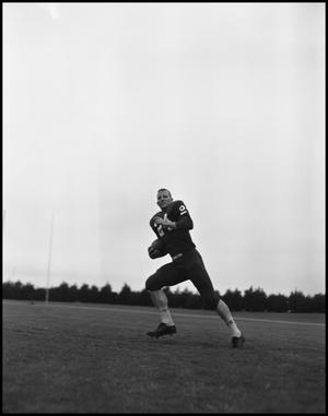 [Football Player No. 24 Running with a Ball, September 1962]