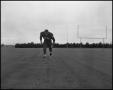 Photograph: Football Player No. 79 Running in a Low Position, September 1962]