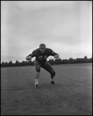 [Football Player No. 54 in a Blocking Position, September 1962]