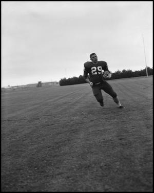 [Football Player No. 29 Running with the Ball, September 1962]