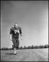 Photograph: [Football Player Number 74 on the Football Field]