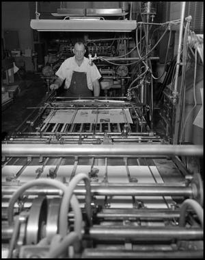 [Man Working in Print Shop]