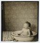 Photograph: [Douglas Clark taking a bath]