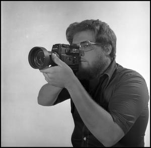 [Side-profile of filmmaker Lewis Abernathy]