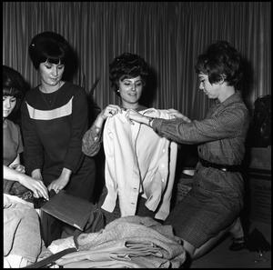[Alpha Delta Pi members pack clothing for the Foster Parents Plan, 1966]