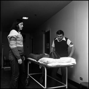 [Alpha Phi Omega members Harrison Gillum and Bill Marks on infirmary duty, 1973]