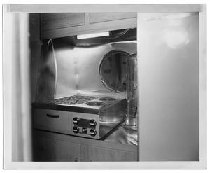 [Oven Range and Percolator in the Kitchenette]