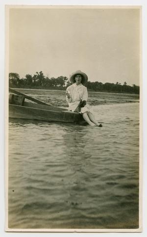 [Woman Sitting in a Boat]
