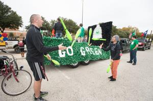 Primary view of object titled '[Jugglers in UNT Homecoming parade]'.