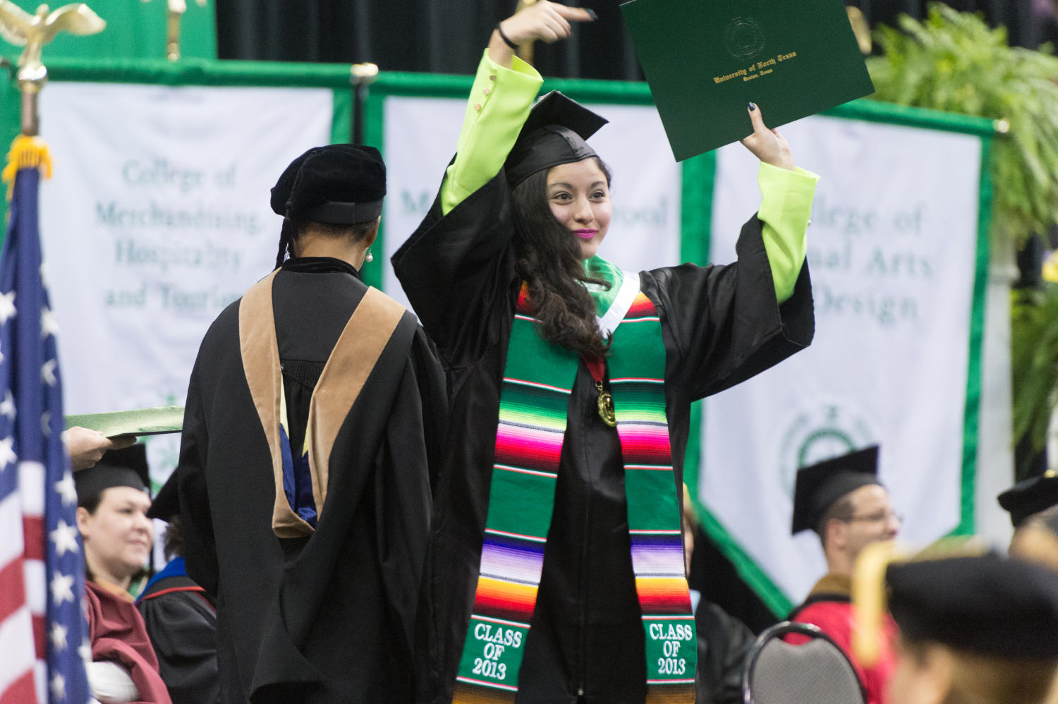 [Student holding diploma] UNT Digital Library