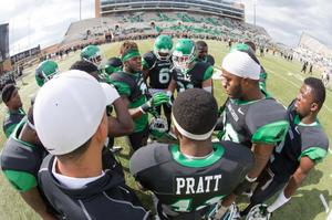 [UNT Mean Green football players 2]