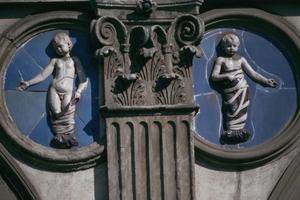 Primary view of Ceramic Tondi at Loggia of Foundling Hospital. Florence (left one by ROBBIA, right one is 19th c. addition)