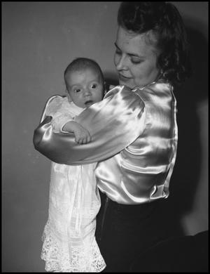 [Jennie Krent with a baby, 2]
